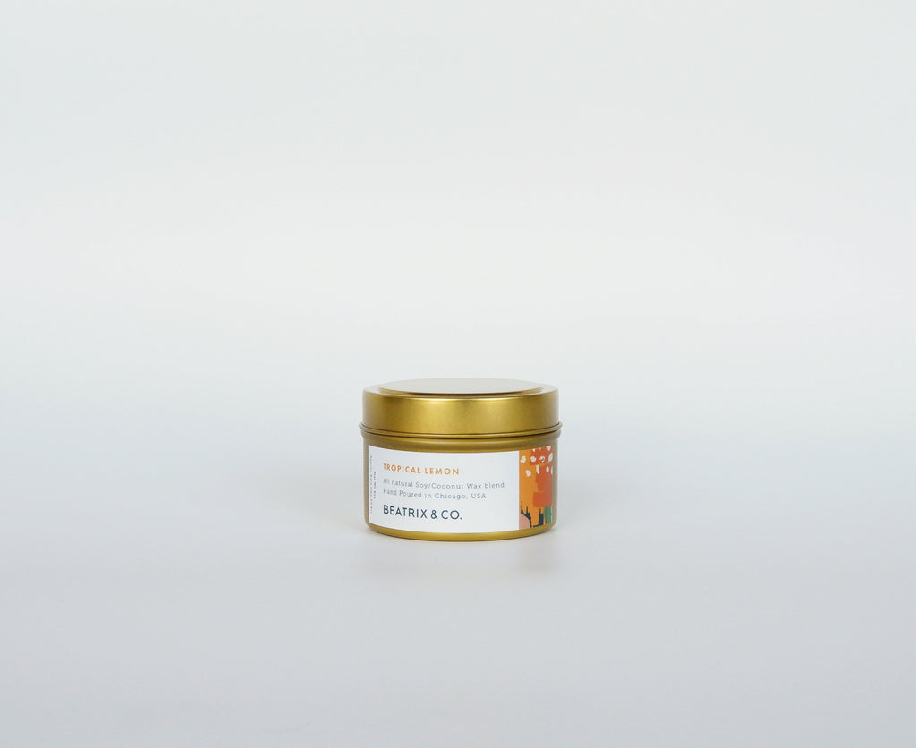 TROPICAL LEMON 4 OZ GOLD CANDLE TIN